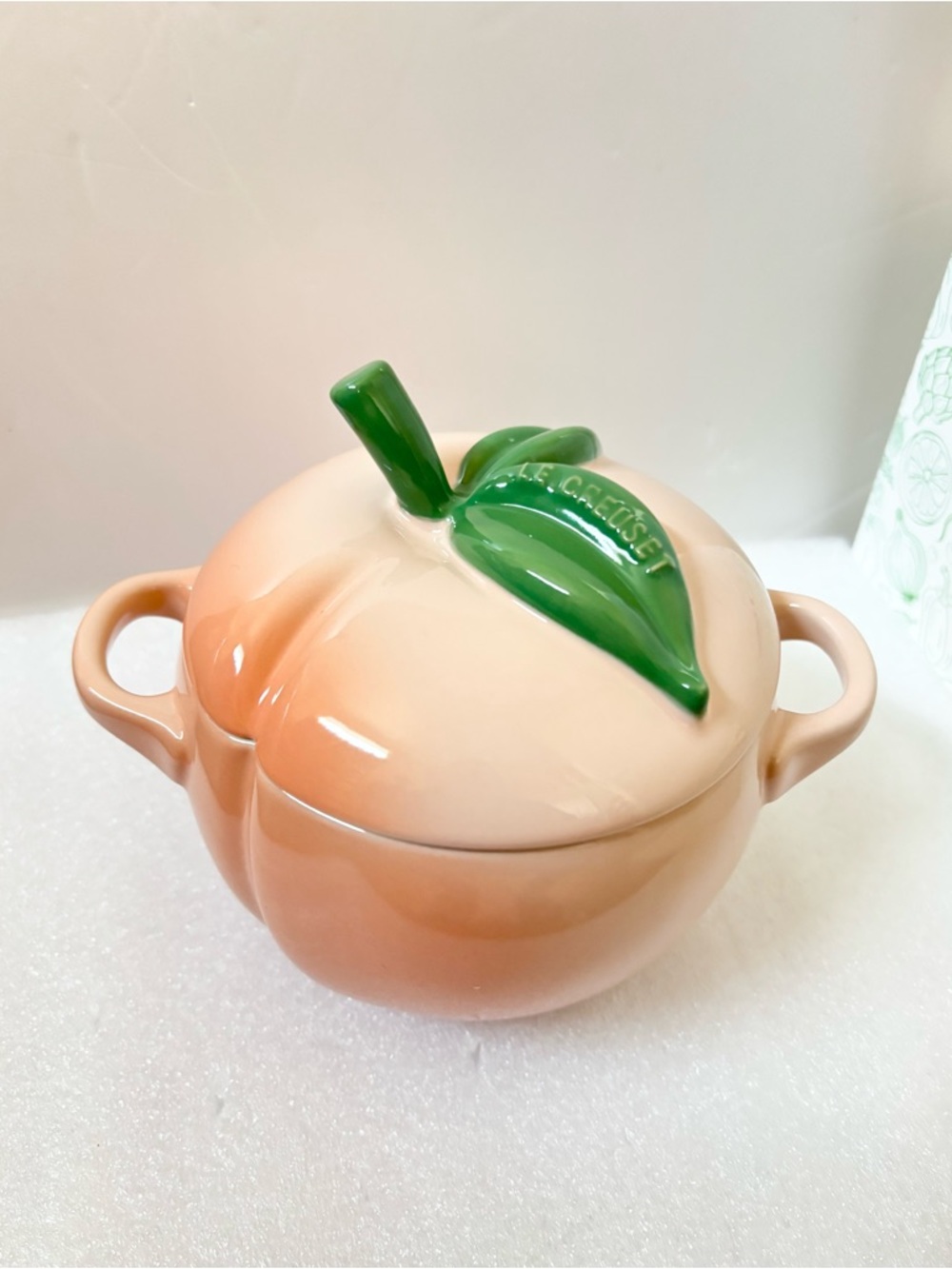 Le Creuset Peach Mini Cocotte with Glossy Green Leaf